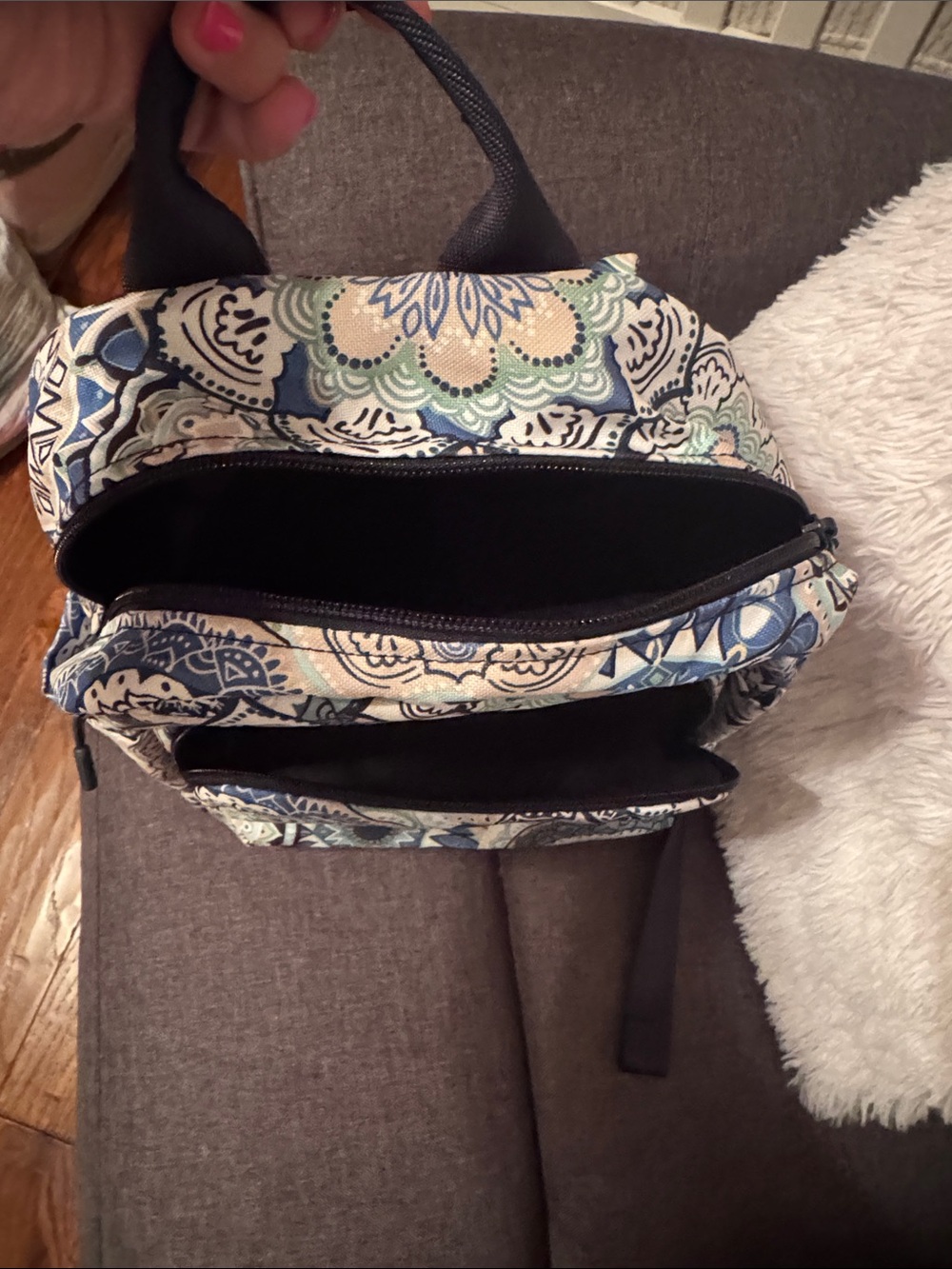 Patterned backpack on couch - Picture 3 of 3